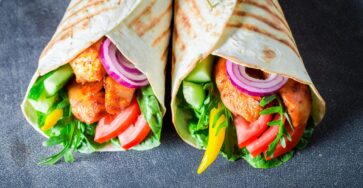 Easy chicken wrap with grilled chicken, vegetables, cheese, and tortilla bread