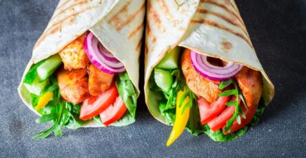 Easy chicken wrap with grilled chicken, vegetables, cheese, and tortilla bread