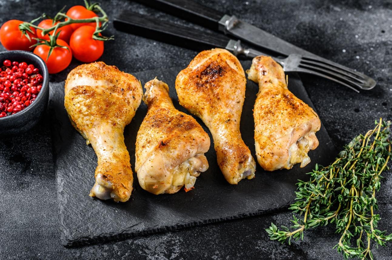 Oven baked chicken drumsticks with crispy skin and golden color