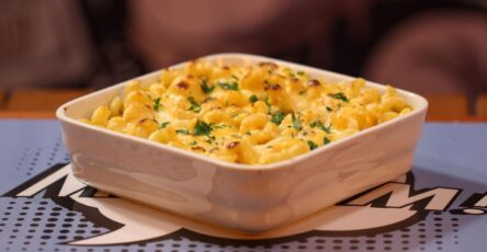 Creamy mac and cheese with cheddar sauce and macaroni pasta