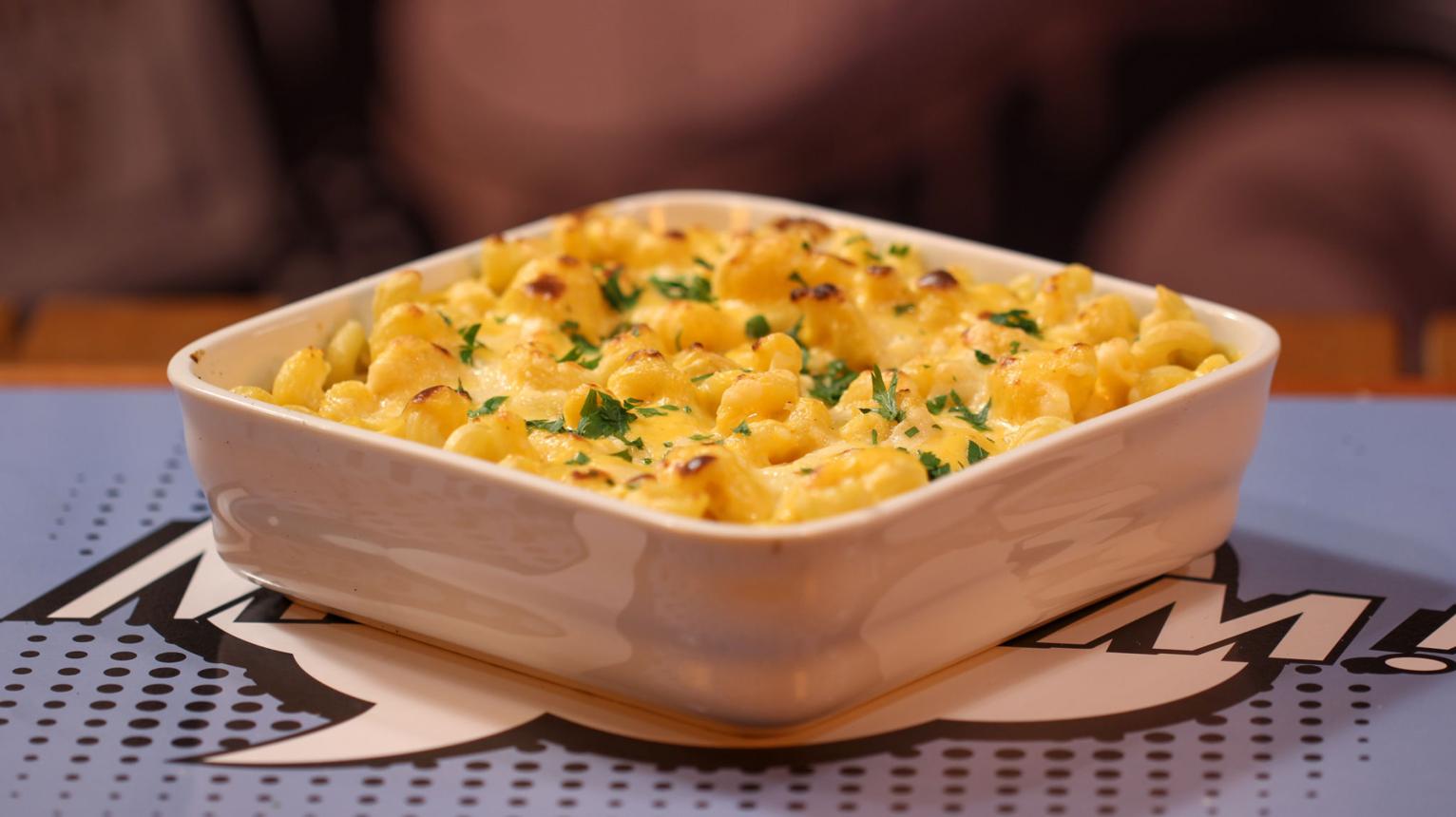 Creamy mac and cheese with cheddar sauce and macaroni pasta