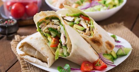 Easy chicken wrap with grilled chicken, lettuce, tomatoes, and tortilla bread