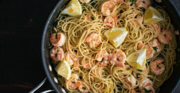 Garlic butter shrimp pasta with creamy sauce and Parmesan cheese