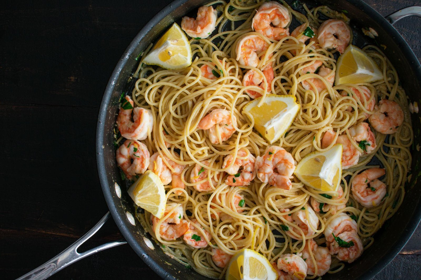 Garlic butter shrimp pasta with creamy sauce and Parmesan cheese