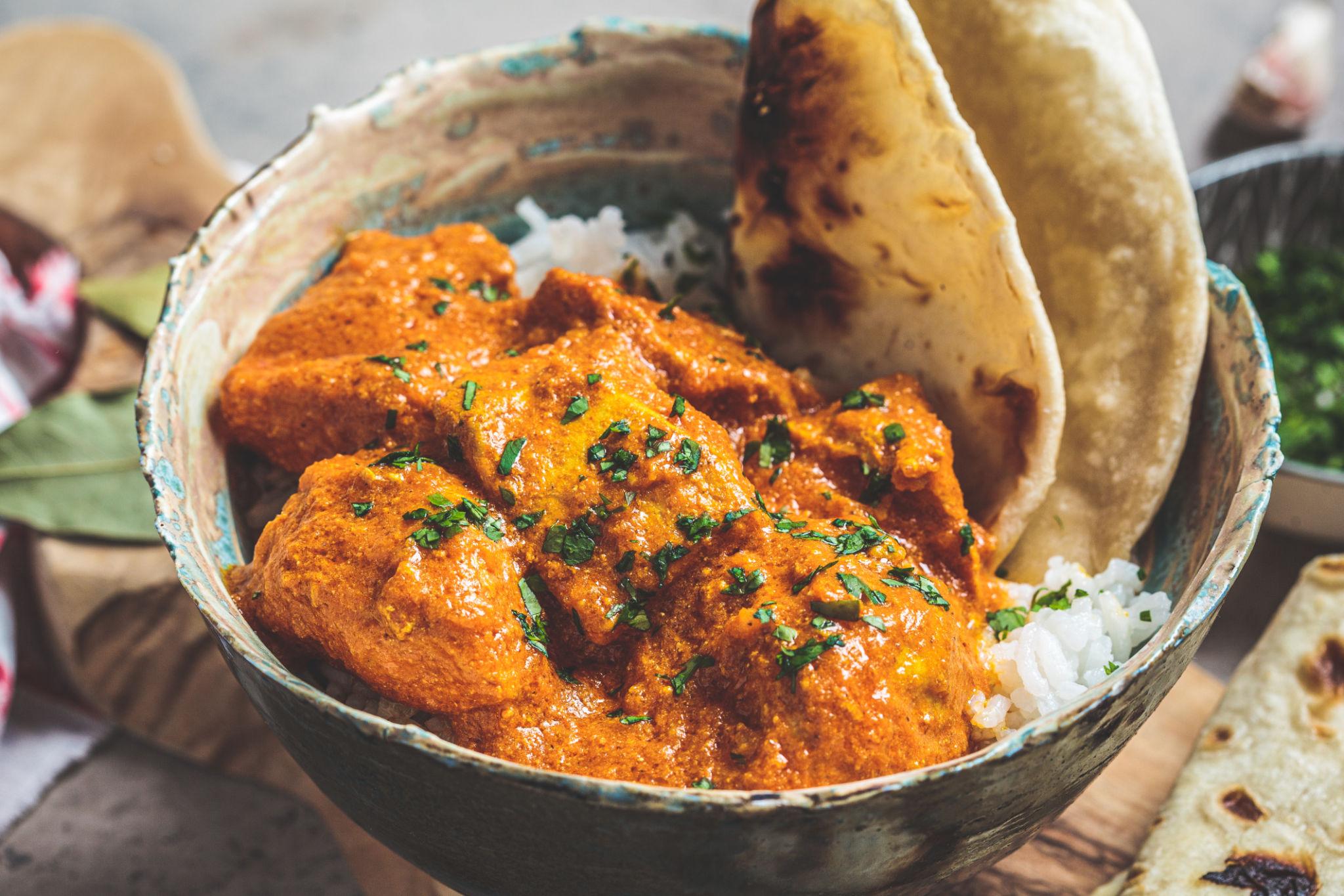 Chicken curry with creamy sauce and tender chicken served with rice